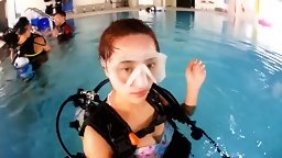 Hong Kong Model Scuba Diving in a Pool