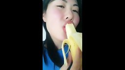 Chinese Slut Sucking Banana